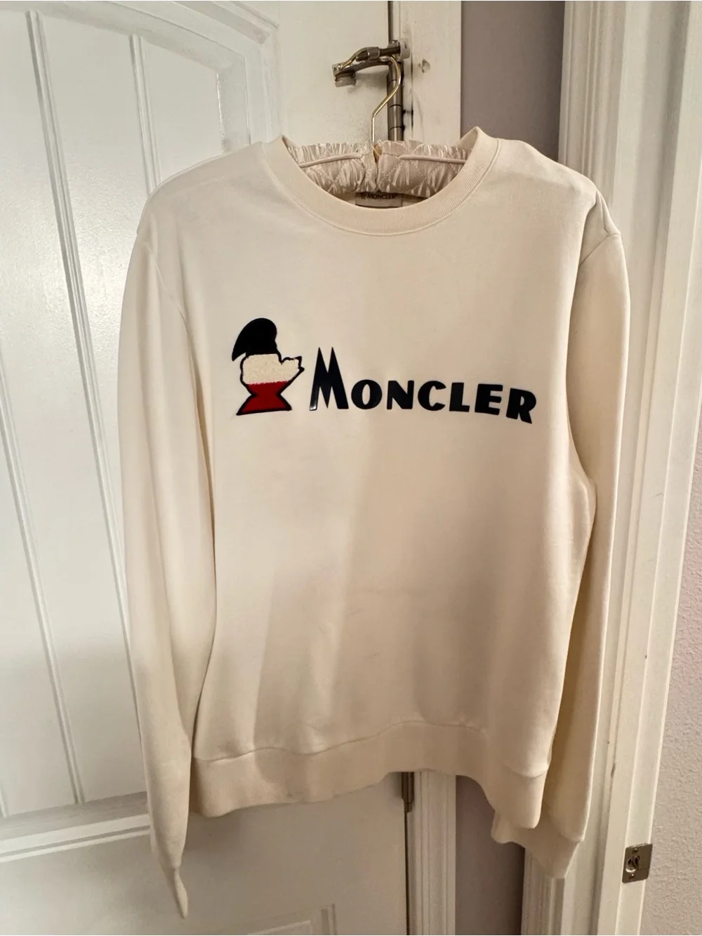 Moncler Cream Crewneck Sweatshirt with Black and Red Logo Patch